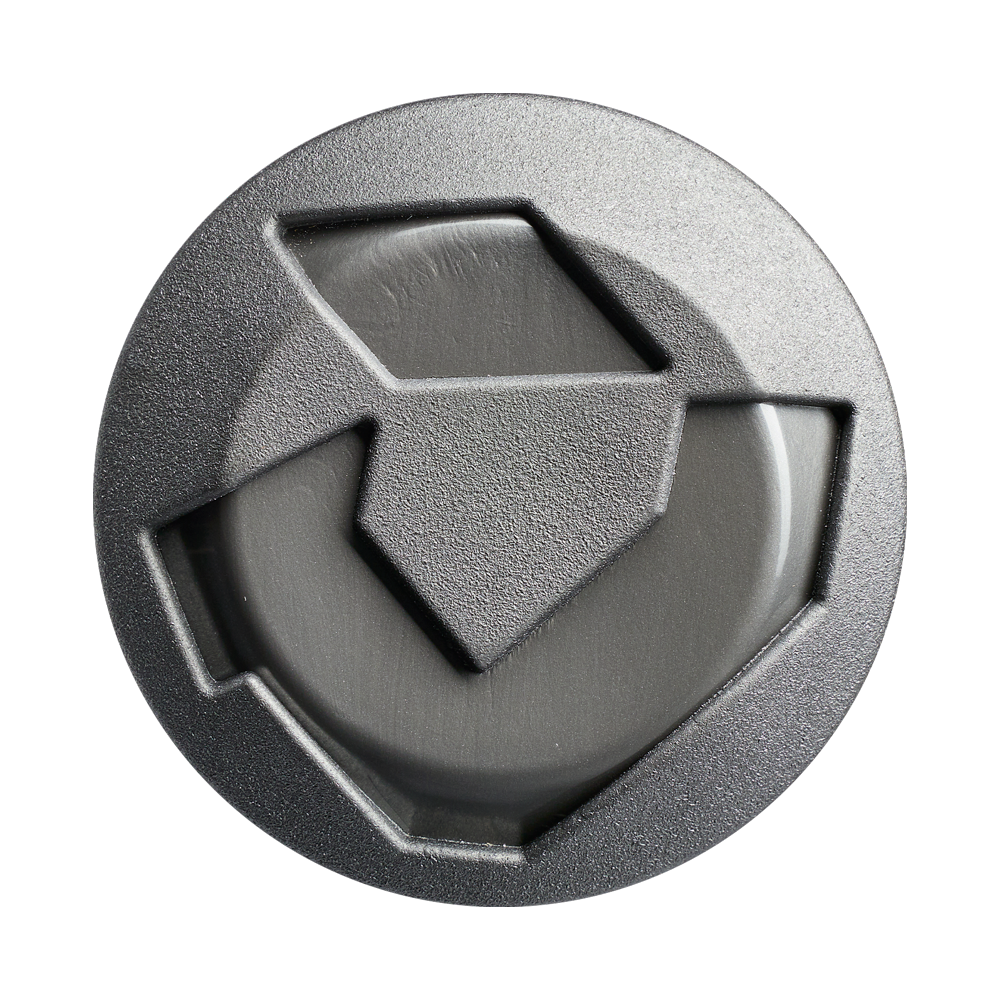 A round, gray plastic camera lens cap with a geometric texture and three triangular grip sections inspired by the grip design of the DeMarini Jason Magnum Vanilla Gorilla 12.5" Endload Softball Bat (WBD2681010).