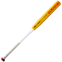 The DeMarini Corndog Wood Composite All Association Slowpitch Softball Bat (WBD2699010) is displayed against a plain white background, showcasing its yellow and white design with red text, a red end cap, a grey grip, and a Pro Maple barrel.