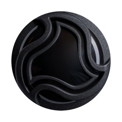 A round, black object with a glossy center and raised, wavy patterns—resembling the intricate design on the DeMarini Exile (-5) 2 3/4" USSSA Baseball Bat (WBD2716010)—is set against a plain light background.