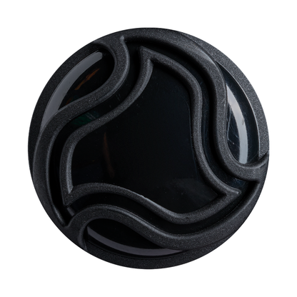 A round black object with raised, wavy lines forming an abstract pattern on its surface, centered against a white background, reminiscent of the precise craftsmanship featured in the 2027 DeMarini Exile (-11) 2 5/8″ USA Baseball Bat: WBD2719010 by DeMarini.