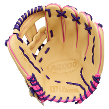 A top-down view of the Wilson A2000 1720SS 11.5″ Baseball Glove (WBG0009401RT115) by Wilson, featuring a tan design with purple and pink laces that highlight the inside pocket and detailed stitching—ideal for infielders.