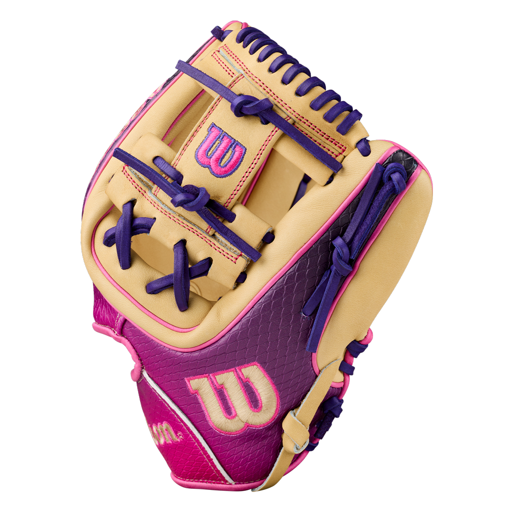 The Wilson A2000 1720SS 11.5″ Baseball Glove (WBG0009401RT115) by Wilson features a tan, pink, and purple color scheme with decorative stitching and prominent W logos, displayed against a plain white background.