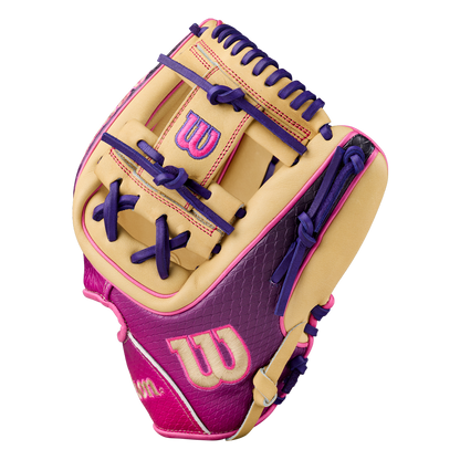 The Wilson A2000 1720SS 11.5″ Baseball Glove (WBG0009401RT115) by Wilson features a tan, pink, and purple color scheme with decorative stitching and prominent W logos, displayed against a plain white background.