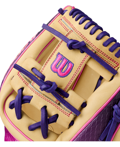 Close-up of the Wilson A2000 1720SS 11.5″ Baseball Glove (WBG0009401RT115) in beige, highlighted with vibrant purple and pink laces, and featuring a pink and purple embroidered Wilson “W” logo.