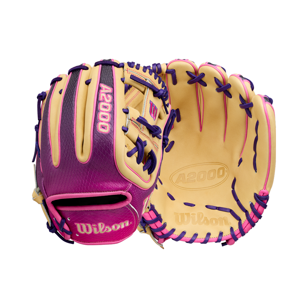 Two Wilson A2000 baseball gloves are shown, including the Wilson A2000 1720SS 11.5″ Baseball Glove (WBG0009401RT115) by Wilson—one pictured from the back and one from the palm side. These infield gloves feature a stylish tan design with purple and pink accents, highlighted by purple laces. Each glove measures 11.5 inches, offering players both standout style and high-level performance on the field.