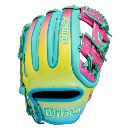 A vibrant Wilson A2000 1727SS 11.5″ Baseball Glove (WBG0009501RT1175) by Wilson, crafted with yellow, teal, and pink leather, accented by teal laces and SuperSnakeSkin detailing, is displayed palm side down on a white background.