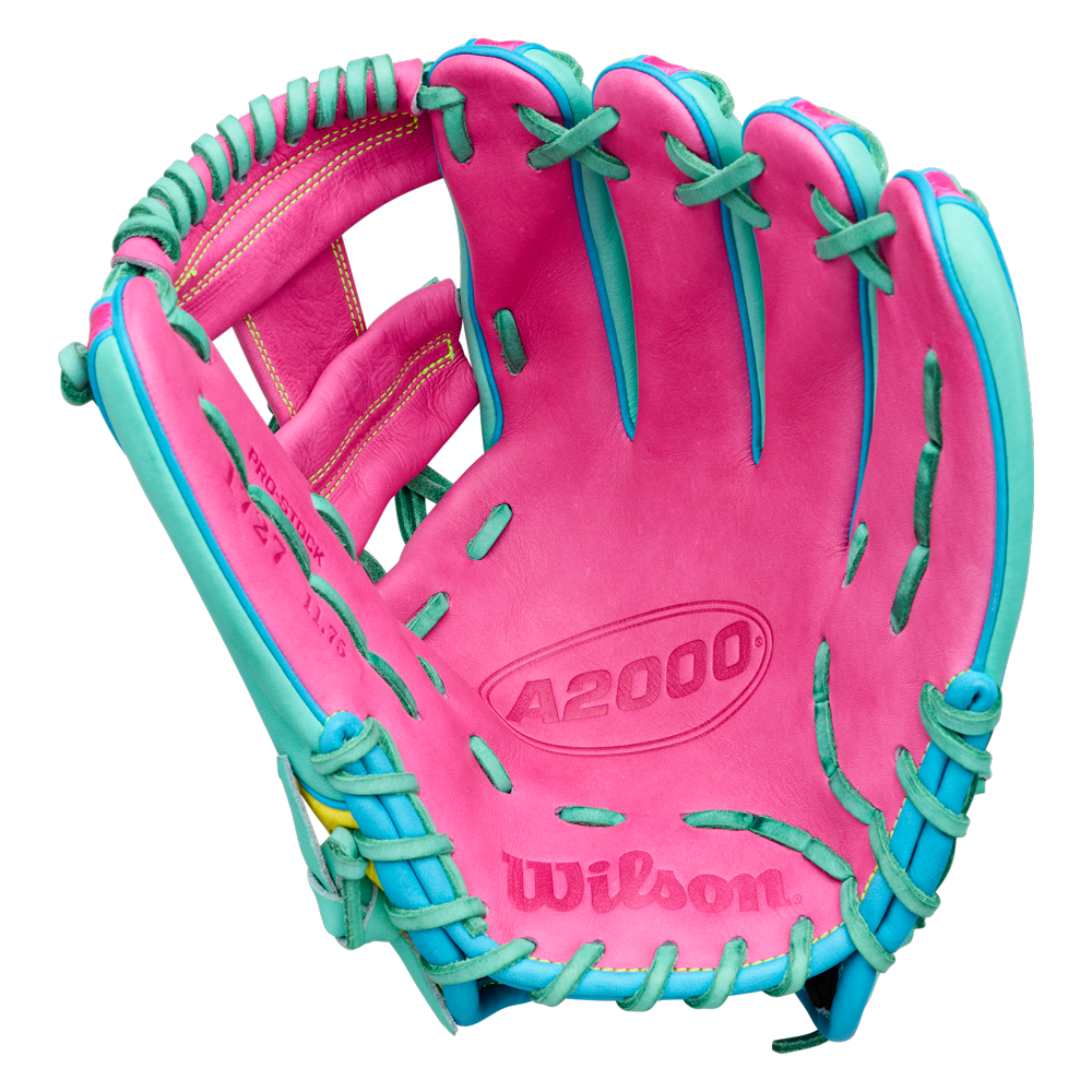 A Wilson A2000 1727SS 11.5″ Baseball Glove (model WBG0009501RT1175) by Wilson is displayed open with the palm side visible, showcasing its pink color with teal lacing and accents and SuperSnakeSkin construction against a white background.