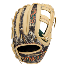 A Wilson A2000 GH2 11.75″ Gunnar Henderson GM Baseball Glove (WBG0009601RT1175) featuring a tan and camouflage design, with the Wilson brand name in orange text. Inspired by Gunnar Henderson’s glove, this infield glove is laced with tan leather.