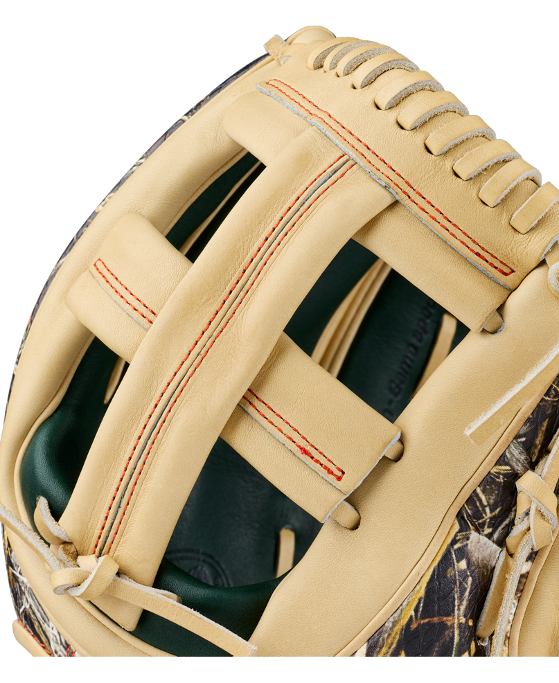 Close-up of the Wilson A2000 GH2 11.75″ Gunnar Henderson GM Baseball Glove (WBG0009601RT1175), featuring tan leather construction, red stitching, a camouflage pattern on the sides, and detailed laces and webbing, inspired by Gunnar Henderson’s signature design.