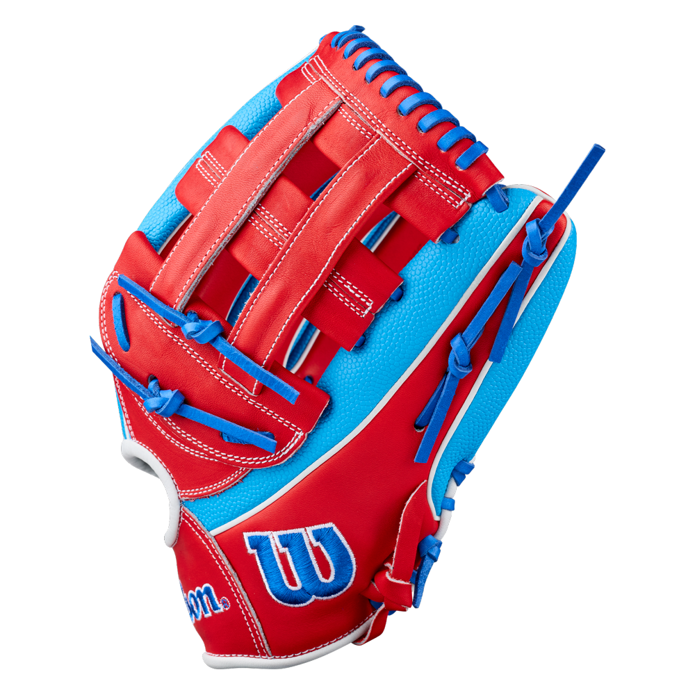 A red and blue outfield baseball glove with white stitching and a white “W” embroidered on the lower part, inspired by the iconic Wilson A2000 PCA4 12.5″ Pete Crow-Armstrong GM Baseball Glove (WBG0009701) from Wilson.
