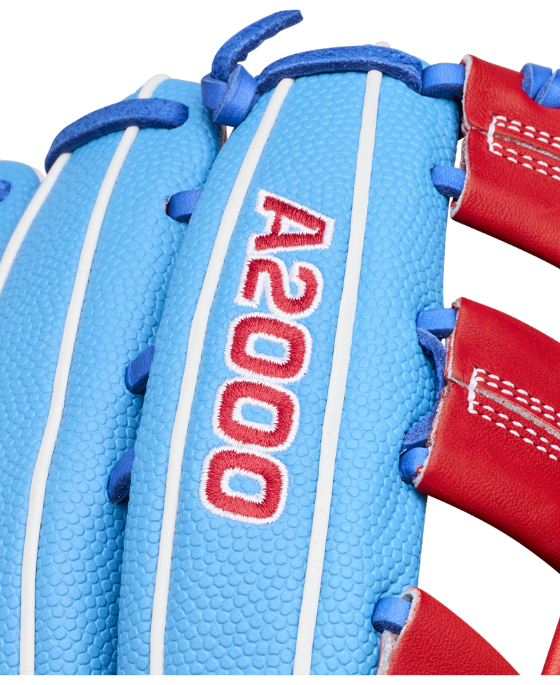 Close-up of a blue and red Wilson A2000 PCA4 12.5″ Pete Crow-Armstrong GM Baseball Glove (WBG0009701) featuring white stitching and the number A2000 embroidered in red and white.