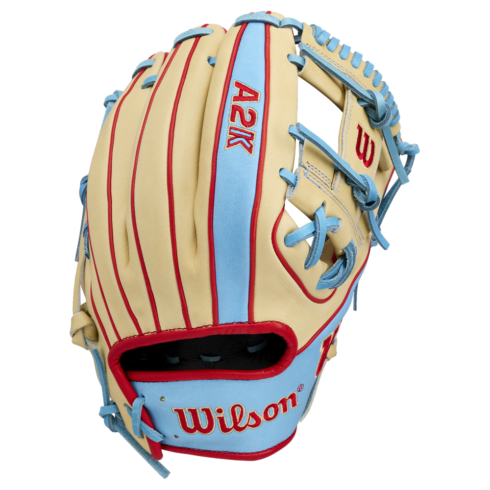 The Wilson A2K 1786 11.5″ Baseball Glove (WBG0010101RT115) by Wilson is showcased against a plain white background, featuring a beige and light blue design crafted from Pro Stock Select leather with striking red stitching and accents.