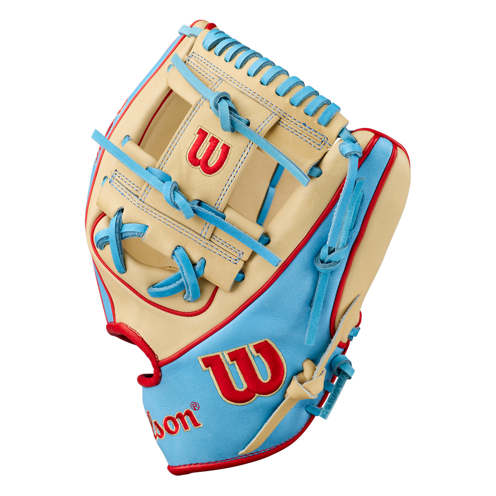 The Wilson A2K 1786 11.5″ Baseball Glove (model WBG0010101RT115) by Wilson is shown on a white background, featuring a tan and light blue color scheme with red stitching and accents. This infield glove is crafted from Pro Stock Select leather and displays a red “W” on the wrist strap and back of the glove.