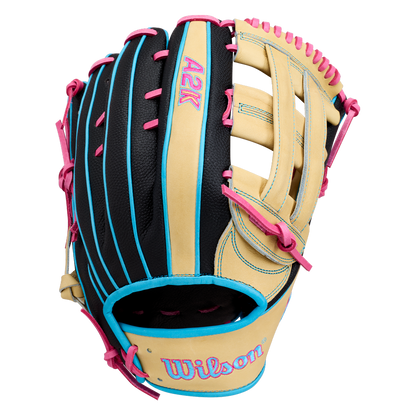 A Wilson A2K 1777 12.75″ Baseball Glove (WBG0010301) by Wilson, in tan, black, and blue with pink laces and stitching, featuring Double Palm Construction, is displayed against a white background.