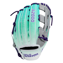 A Wilson A2000 FP50SS 12.25″ Fastpitch Glove (WBG0010501RT1225) by Wilson, in teal and gray with purple laces and accents, is displayed upright showcasing the webbing and prominently featuring the Wilson logo; it also includes an advanced Flex System designed for enhanced comfort and performance.