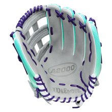 The Wilson A2000 FP50SS 12.25″ Fastpitch Glove (WBG0010501RT1225) by Wilson is displayed open with the palm facing forward on a plain white background, showcasing its gray design with teal accents and purple laces. This outfield glove features the innovative Flex System for enhanced performance.