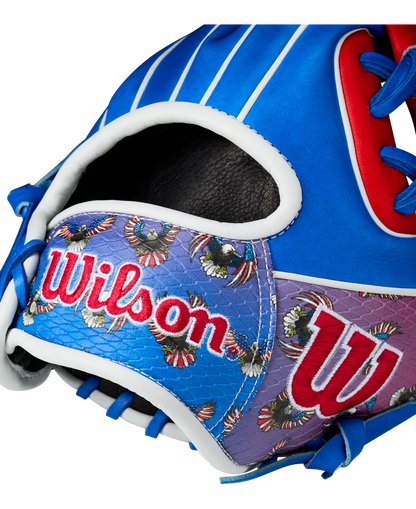 Close-up of the Wilson A2000 1786SS 11.5" Baseball Glove (GOTM July 2026), featuring blue, red, and purple Pro Stock leather with intricate stitching, colorful embroidered patterns, and the Wilson logo displayed prominently.