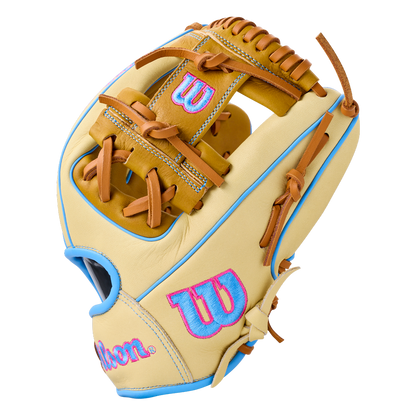 Tan 11.5″ Wilson A1000 1786 11.5″ Baseball Glove: WBG02501RT1786 with light blue piping, brown lacing, and bright blue and pink logos.