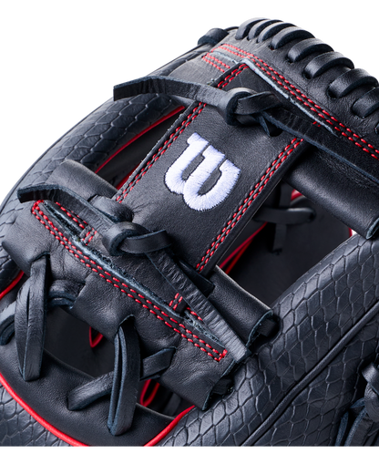 Close-up of a black Wilson A1000 1975SS 11.75″ Baseball Glove featuring red stitching and a textured leather pattern.
