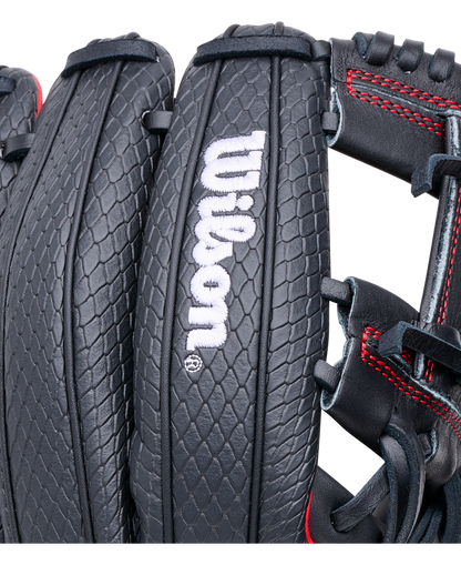 Close-up of a black Wilson A1000 1975SS 11.75″ Baseball Glove with a textured, scale-like pattern and red stitching along the seams.