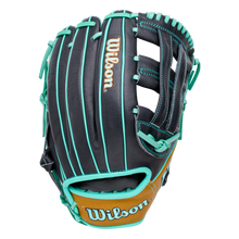 Black Wilson A1000 DW5 12″ Baseball Glove: WBG02701RTDW5 with teal lacing and stitching, and tan leather trim at the wrist.