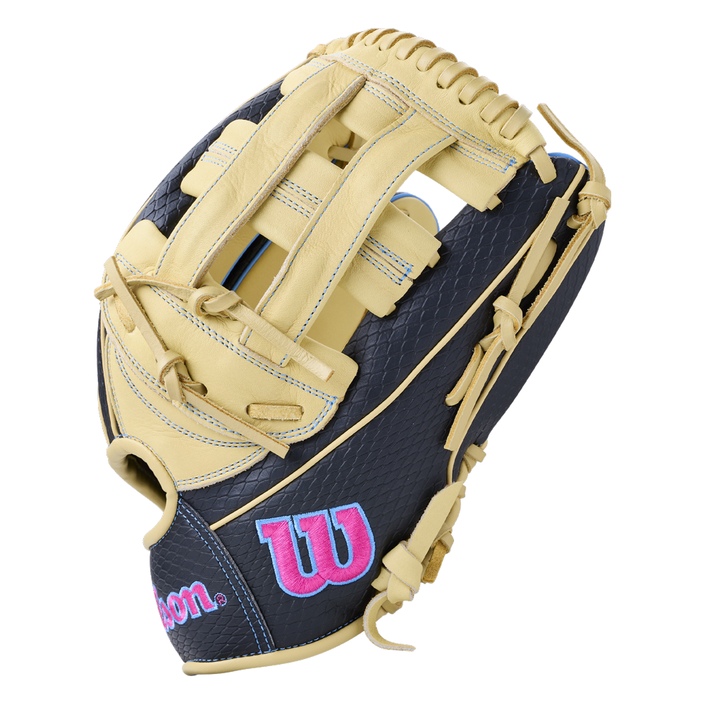 Wilson A1000 1750 12.5″ Baseball Glove with tan leather webbing and fingers, a dark blue patterned leather palm, and bright pink and blue logos.