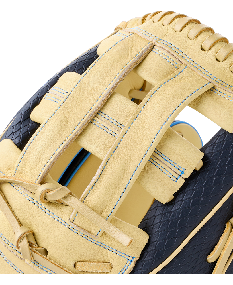 Close-up of the web and pocket of a tan and dark blue Wilson A1000 1750 12.5″ Baseball Glove: WBG02901RT1750 with blue stitching.