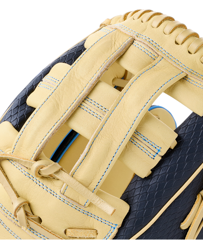 Close-up of the web and pocket of a tan and dark blue Wilson A1000 1750 12.5″ Baseball Glove: WBG02901RT1750 with blue stitching.