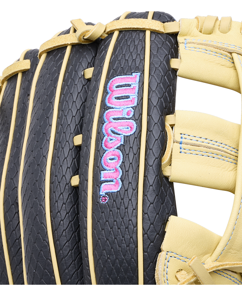 Close-up of a black textured Wilson A1000 1750 12.5″ Baseball Glove: WBG02901RT1750 with tan leather accents and an embroidered pink and blue logo.