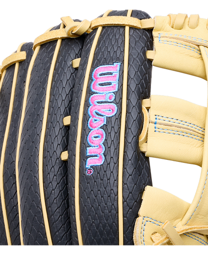 Close-up of a black textured Wilson A1000 1750 12.5″ Baseball Glove: WBG02901RT1750 with tan leather accents and an embroidered pink and blue logo.