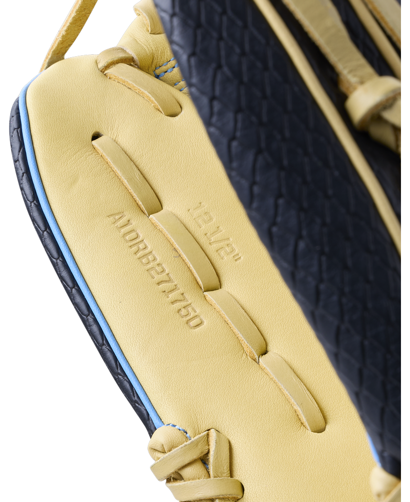 Close-up of a yellow and black Wilson A1000 1750 12.5″ Baseball Glove, showing the embossed text 12 1/2 and A10RB271750 on the inner palm.