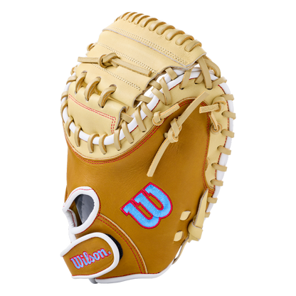 Wilson A1000 PF33 33″ Baseball Catcher’s Mitt in tan, featuring a deep pocket, webbed lacing, and blue and pink logo embroidery.