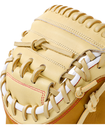 Close-up of a tan Wilson A1000 PF33 33″ Baseball Catcher’s Mitt: WBG03001RTPF33 with thick white lacing.