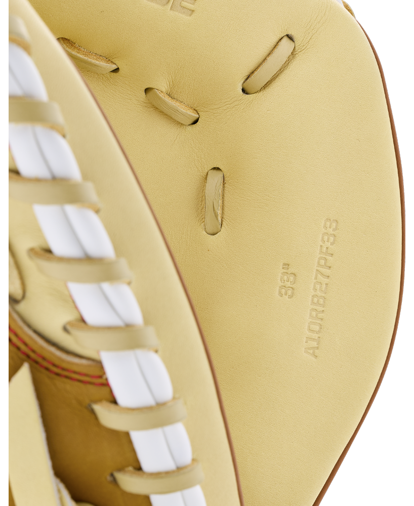 Close-up of a tan Wilson A1000 PF33 33″ Baseball Catcher’s Mitt featuring white lacing, with 33 and A10RB27PF33 embossed on the inner palm.