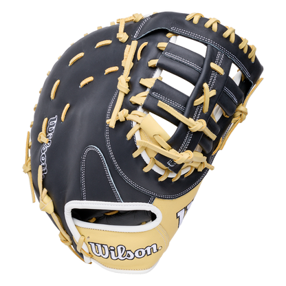 A 12.5″ black and tan Wilson A1000 PF1612 12″ Baseball First Base Mitt: WBG03101RT12 crafted from full grain leather with light-colored lacing.