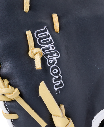 Close-up of a Wilson A1000 PF1612 12″ Baseball First Base Mitt, featuring black leather, light-colored laces, and white embroidered branding.