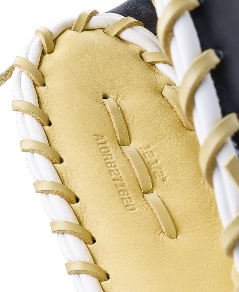 Close-up of a Wilson A1000 PF1612 12″ Baseball First Base Mitt, a yellow leather baseball mitt with white lacing, stamped with 12 1/2 and A10RB271620.