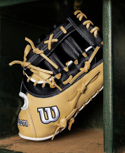 Wilson A1000 PF1612 12″ Baseball First Base Mitt, a 12.5″ black and tan mitt crafted from full grain leather with tan lacing.