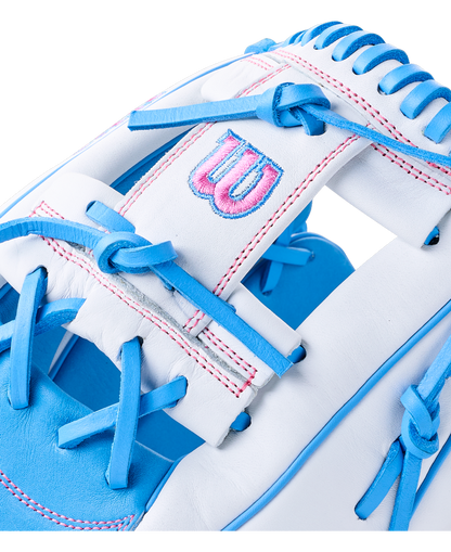White and light blue Wilson A1000 H12 12″ Fastpitch Glove: WBG03201RTH12 with blue laces and pink stitching.