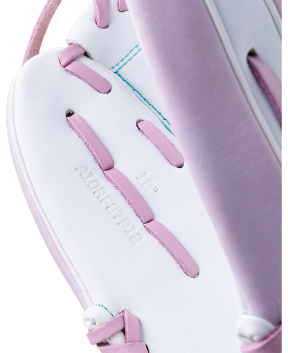 Close-up of a white and lavender Wilson A1000 P12 12″ Fastpitch Glove: WBG03401RTP12 with pink leather laces.