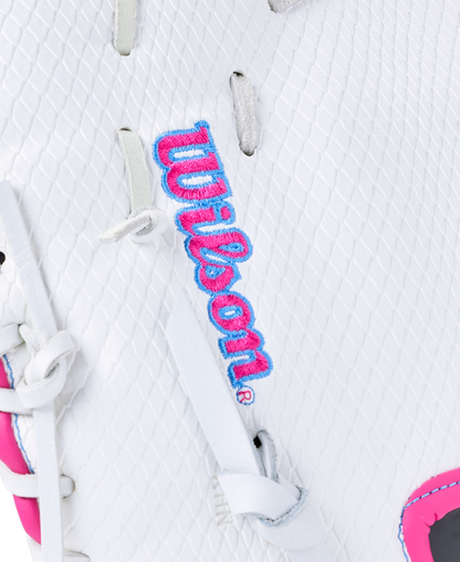Close-up of a white Wilson A1000 FP1620SS 12.5″ Fastpitch First Base Mitt featuring blue and pink embroidered logo text.