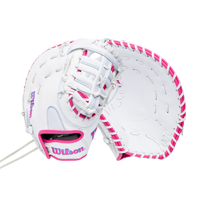 Wilson A1000 FP1620SS 12.5″ Fastpitch First Base Mitt in white with pink lacing and blue and pink lettering.