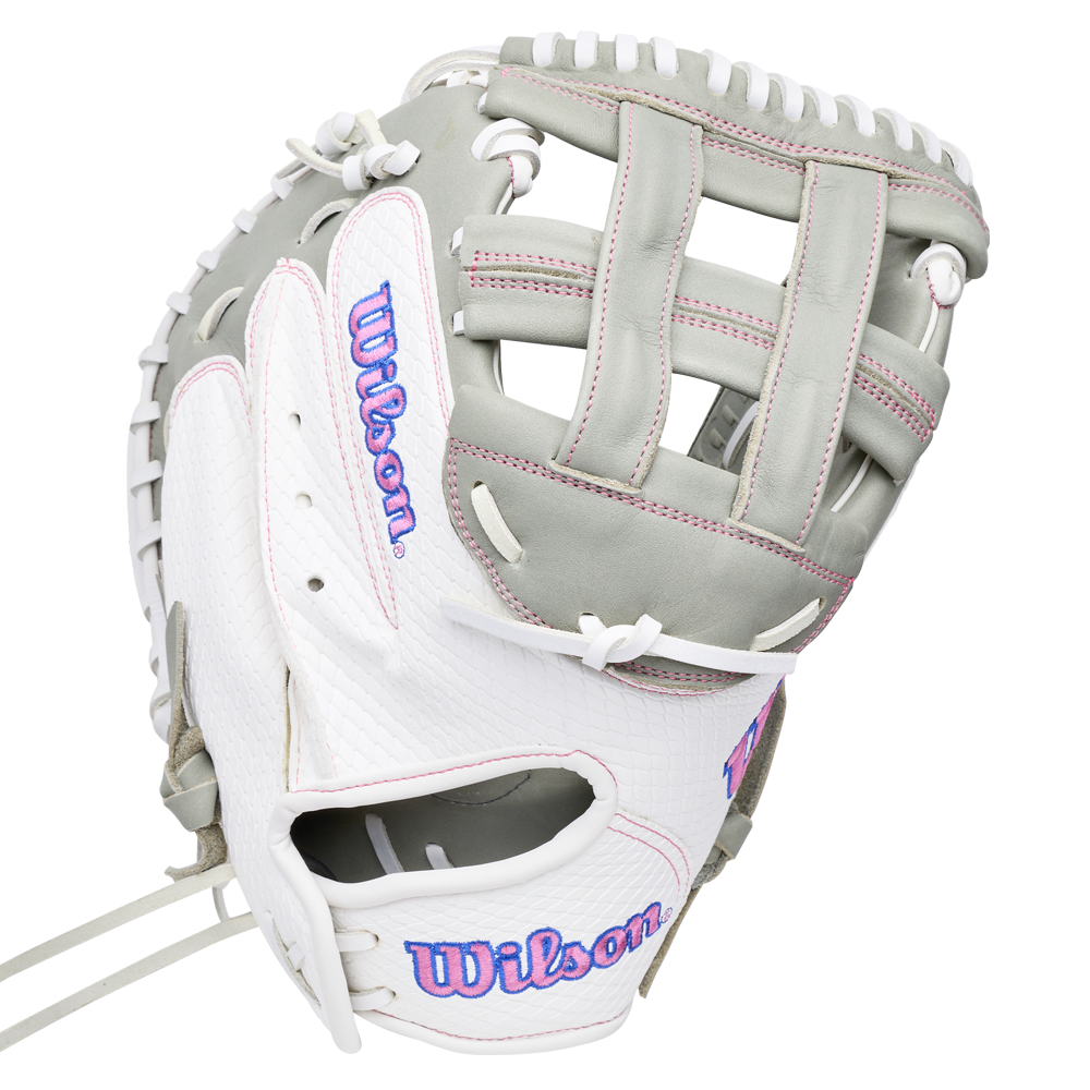 White and grey Wilson A1000 FPCM33 33″ Fastpitch Catcher’s Mitt with pink stitched accents.