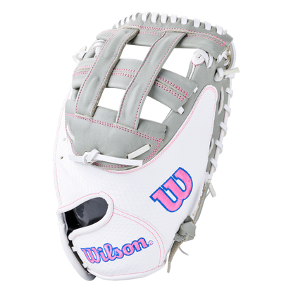 Grey and white Wilson A1000 FPCM33 33″ Fastpitch Catcher’s Mitt with pink logos and white lacing.