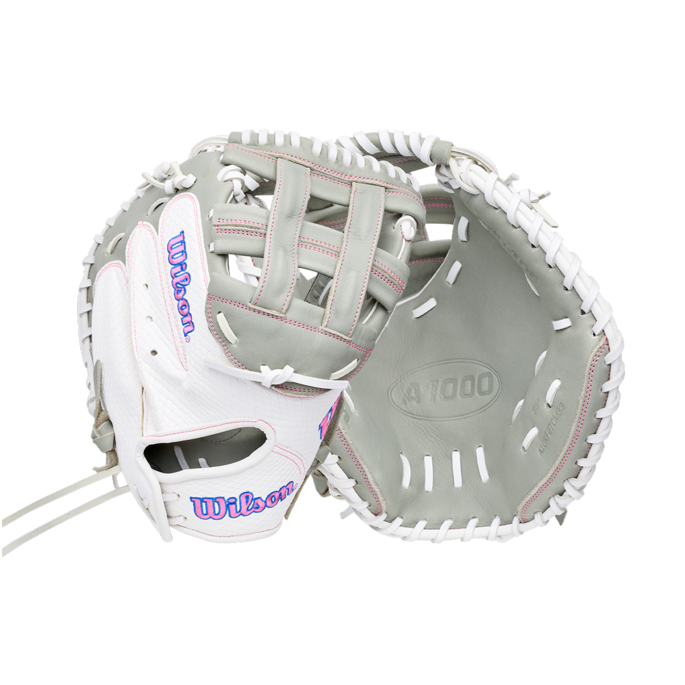 Grey and white Wilson A1000 FPCM33 33″ Fastpitch Catcher’s Mitt: WBG03801RTFC33 with white lacing and pink detailing.