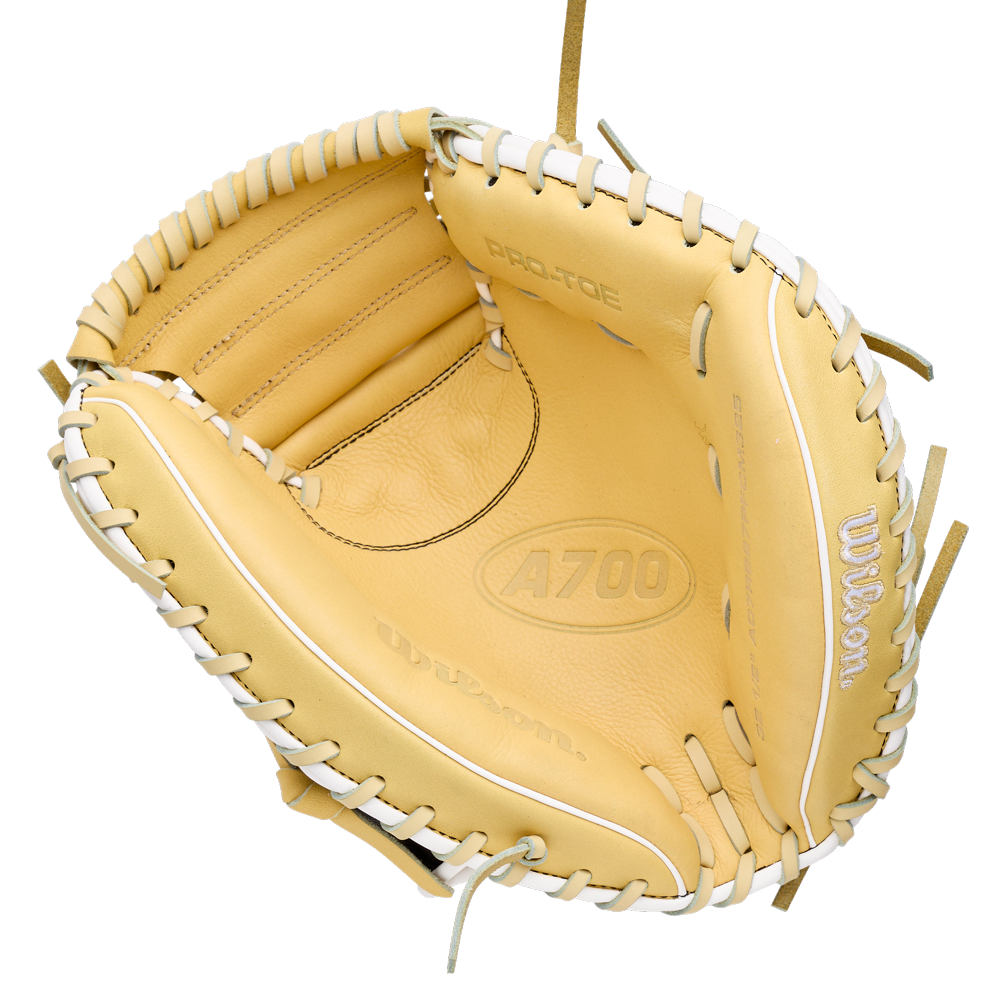 Tan Wilson A700 32.5″ Baseball Catcher’s Mitt: WBG04701RT325 in full grain leather with white lacing and a deep pocket.