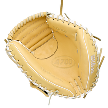 Tan Wilson A700 32.5″ Baseball Catcher’s Mitt: WBG04701RT325 in full grain leather with white lacing and a deep pocket.