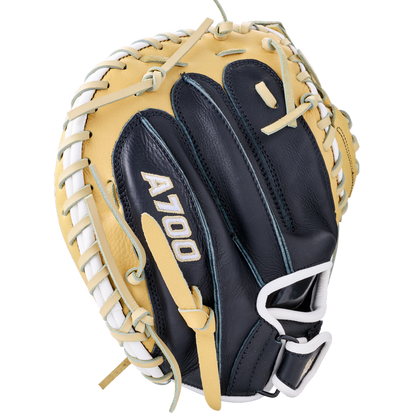Wilson A700 32.5″ Baseball Catcher’s Mitt: WBG04701RT325 in navy blue and tan full grain leather with white lacing and A700 stitched in white on the thumb.