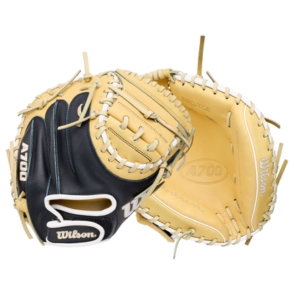 Front and back views of a navy and tan Wilson A700 32.5″ Baseball Catcher’s Mitt: WBG04701RT325, crafted from full grain leather.