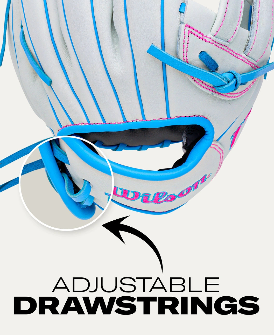 Light gray Wilson A700 12″ Fastpitch Glove: WBG04901RT12 with bright blue trim and pink stitching, with a circular inset highlighting the adjustable drawstring wrist closure.